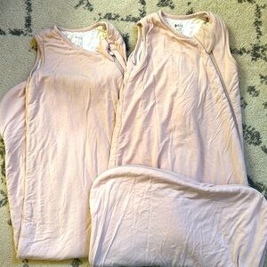 2 Kyte sleep sacks - both 1.0 tog (1) 6-18 mo and (1) sz Large